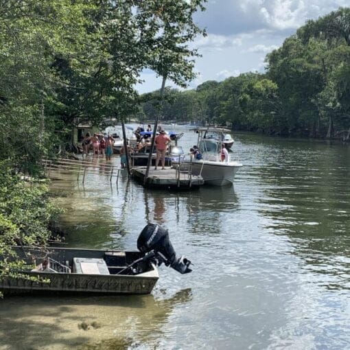 Onlookers tending to injured jet skier In: RE: Florida boaters. Shouldn’t we expect them to have learned how to avoid hitting each other? | Our Santa Fe River, Inc. (OSFR) | Protecting the Santa Fe River